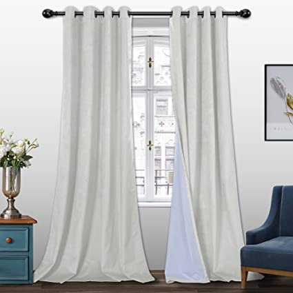 If you're looking for cat proof curtains that will also keep the light out, the BONZER 100% Velvet Blackout Curtains are a great option.